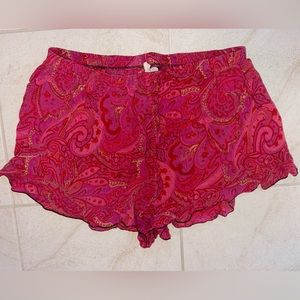 Urban Outfitters pink paisley shorts with ruffle at bottom